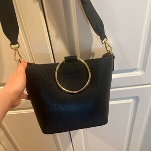 Della Stella Black Handbag with Gold Accents